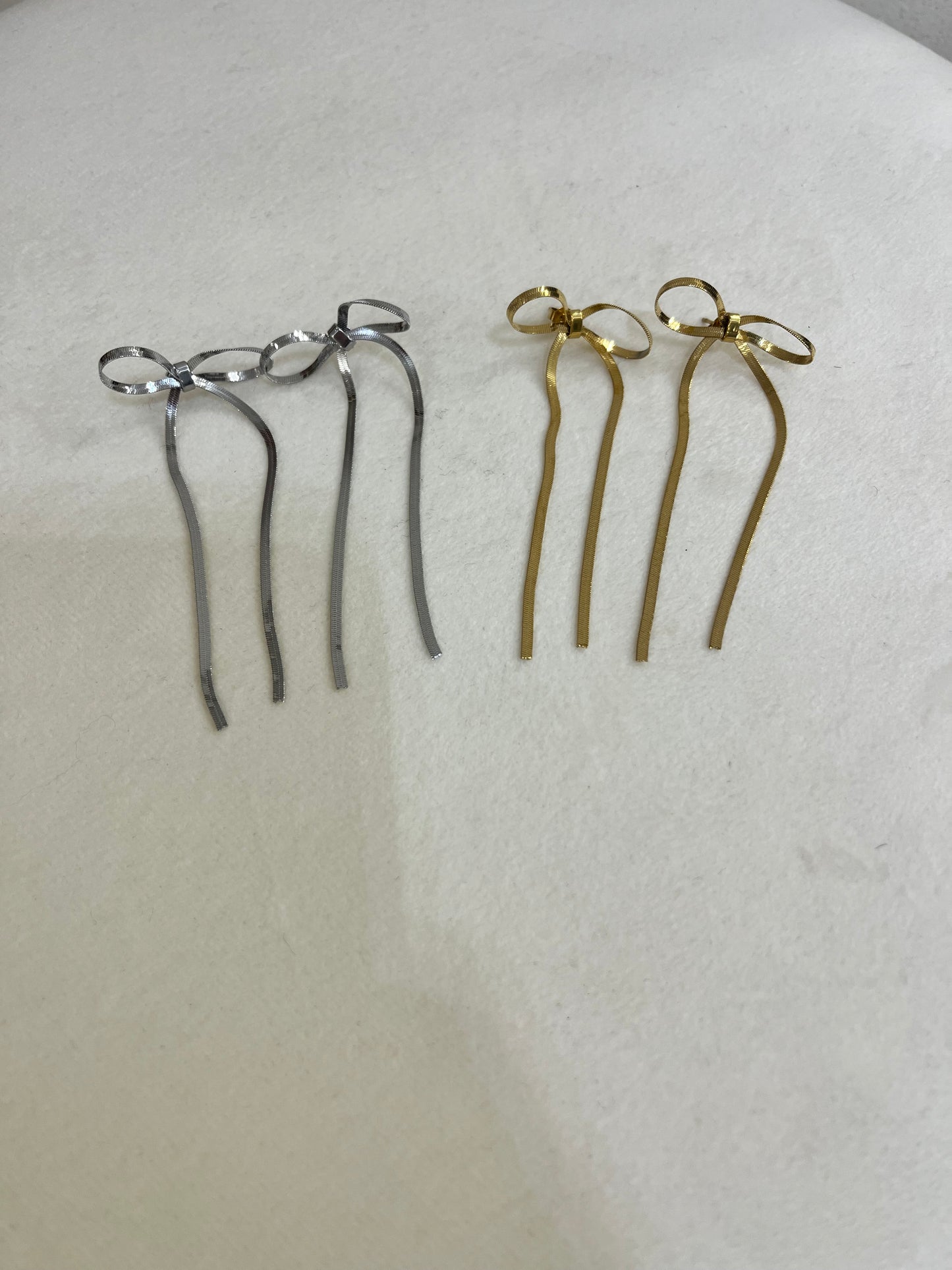 Orecchini pendenti fiocco