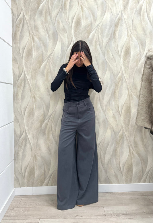 Pantalone largo tasche dietro